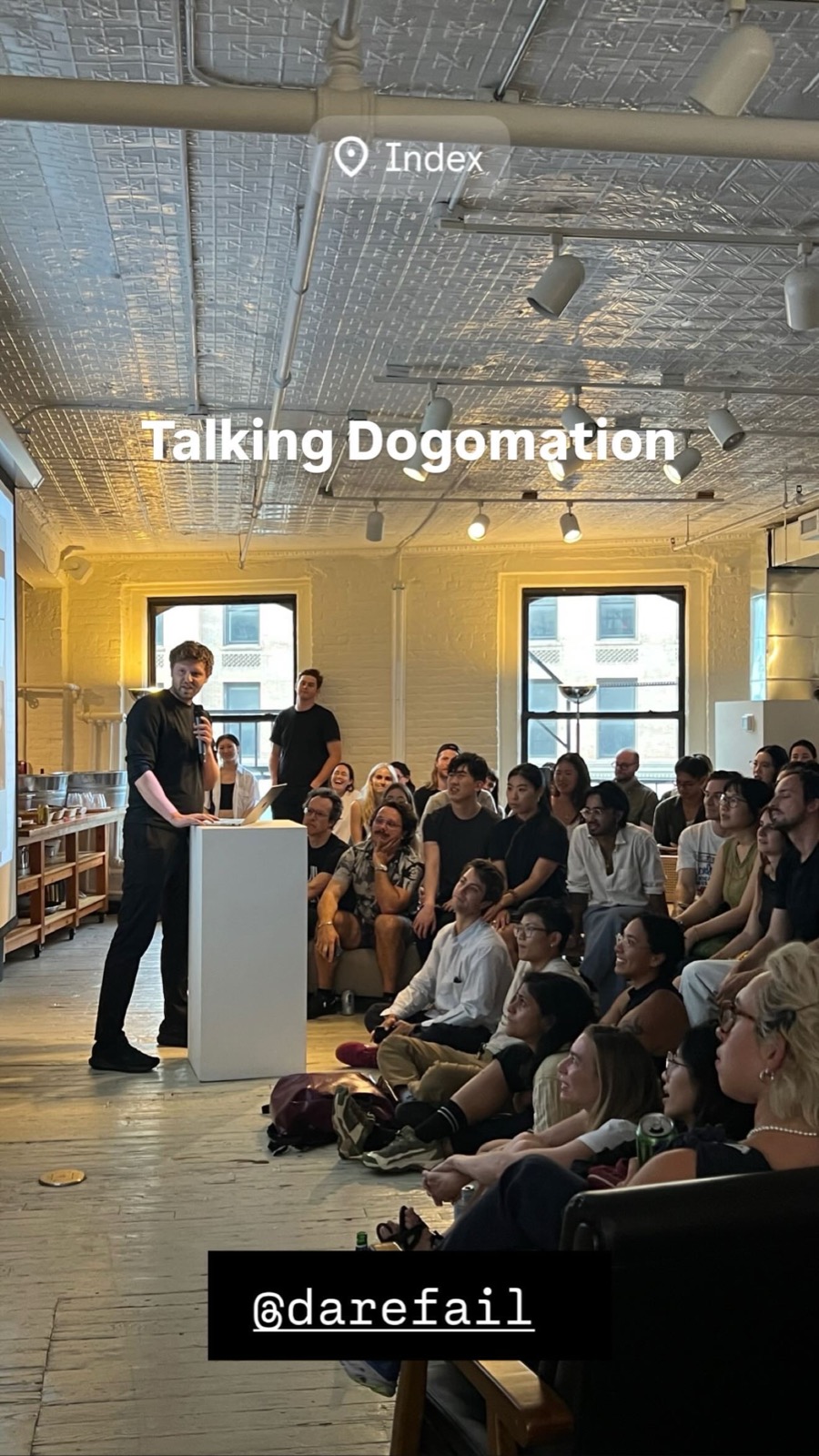 Index event with speaker presenting to audience